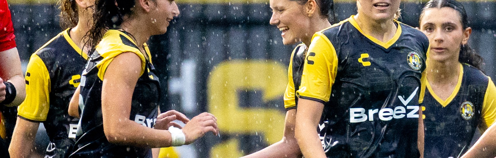Olivia Damico (left) celebrates with teammates after scoring the second goal of the Pittsburgh Riveters' 2-0 win over Flower City 1872 on May 30, 2025 at Highmark Stadium in Pittsburgh. (Photo: Chris Cowger/Riveters SC)
