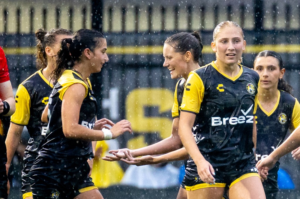 Olivia Damico (left) celebrates with teammates after scoring the second goal of the Pittsburgh Riveters' 2-0 win over Flower City 1872 on May 30, 2025 at Highmark Stadium in Pittsburgh. (Photo: Chris Cowger/Riveters SC)