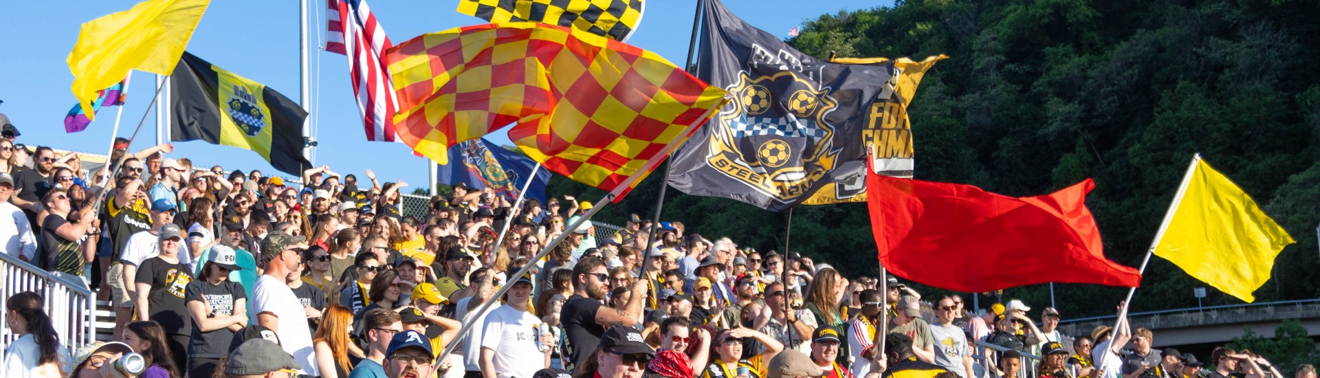 Fans wave flags before the first Pittsburgh Riveters SC match on May 16, 2025 at Highmark Stadium in Pittsburgh. (Photo: John Sykes/Riveters SC)