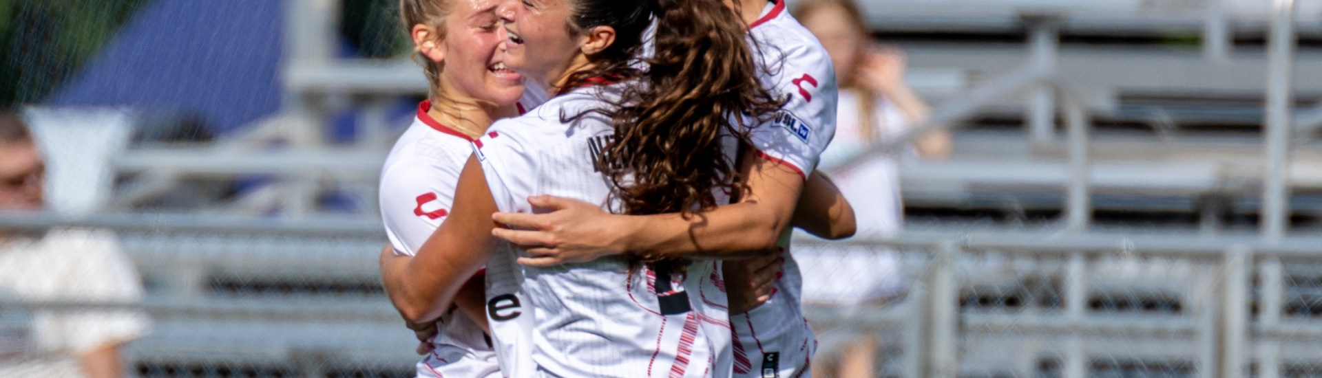 Tanum Nelson (right) celebrates with teammates Alexis Tylenda and Olivia Damico after scoring the first hat trick in Pittsburgh Riveters history in the team's 3-0 win over FC Buffalo on June 8, 2025 at Highmark Stadium in Pittsburgh. (Photo: Chris Cowger/Riveters SC)