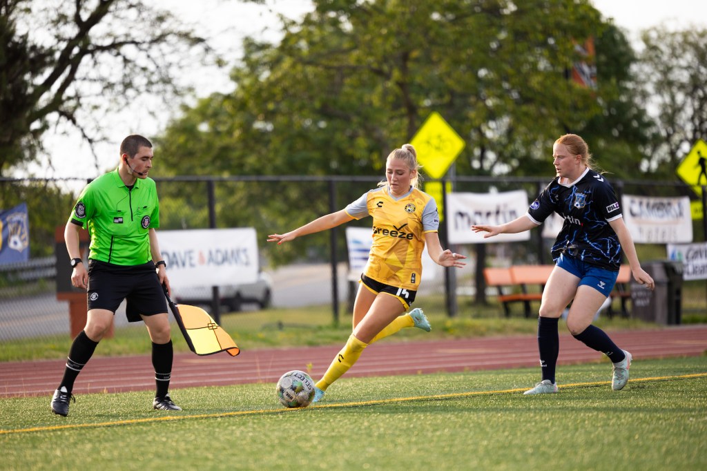 Pittsburgh Riveters forward Alexis Tylenda works her way around FC Buffalo defender Erin Weir in the 1-1 draw between the teams on June 21, 2025 at Coyer Field in Buffalo, N.Y. (Photo: Julia Wasielewski/Riveters SC)