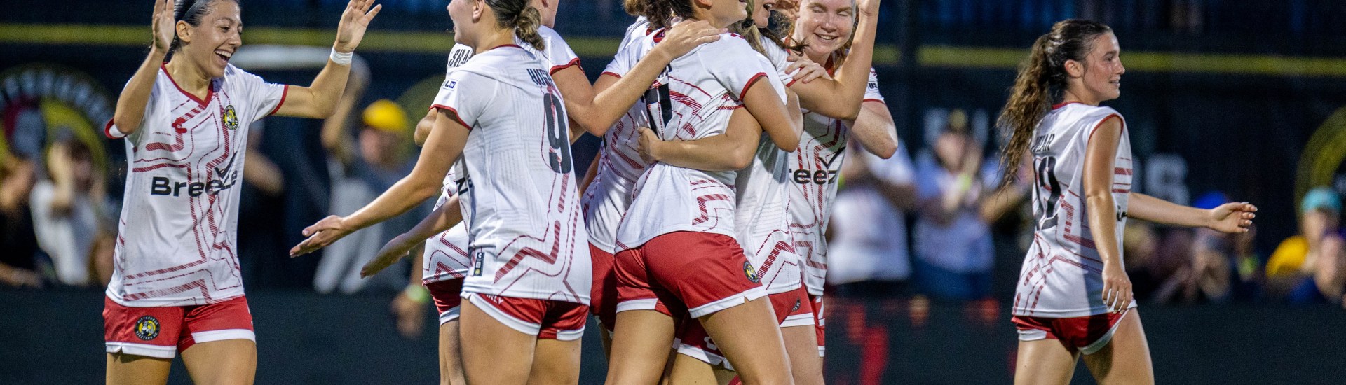Pittsburgh Riveters players celebrate after Gina Proviano scored the winning goal in the team's 2-1 victory over Steel City FC to clinch the Great Forest Division title on June 27, 2025 at Highmark Stadium in Pittsburgh. (Photo: Chris Cowger/Riveters SC)