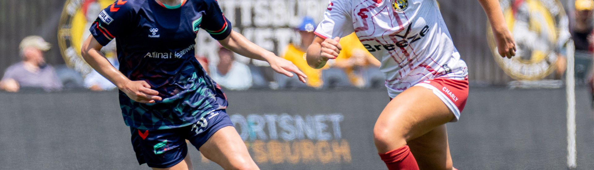 Pittsburgh Riveters defender Natalia DiSora evades Catherine Rapp of the Minnesota Aurora in the Riveters' 2-0 loss in the USL W League Playoffs on July 4, 2025 at Highmark Stadium in Pittsburgh. (Photo: Chris Cowger/Riveters SC)