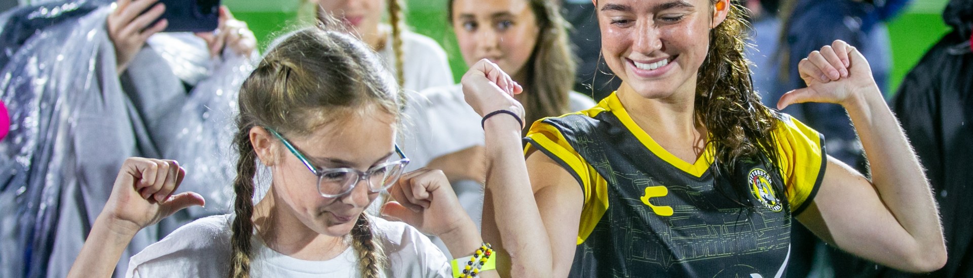Pittsburgh Riveters defender Bella Vozar poses with a fan after the team's 2-0 win over Flower City 1872 at Highmark Stadium in Pittsburgh. (Photo: Chris Cowger/Riveters SC)