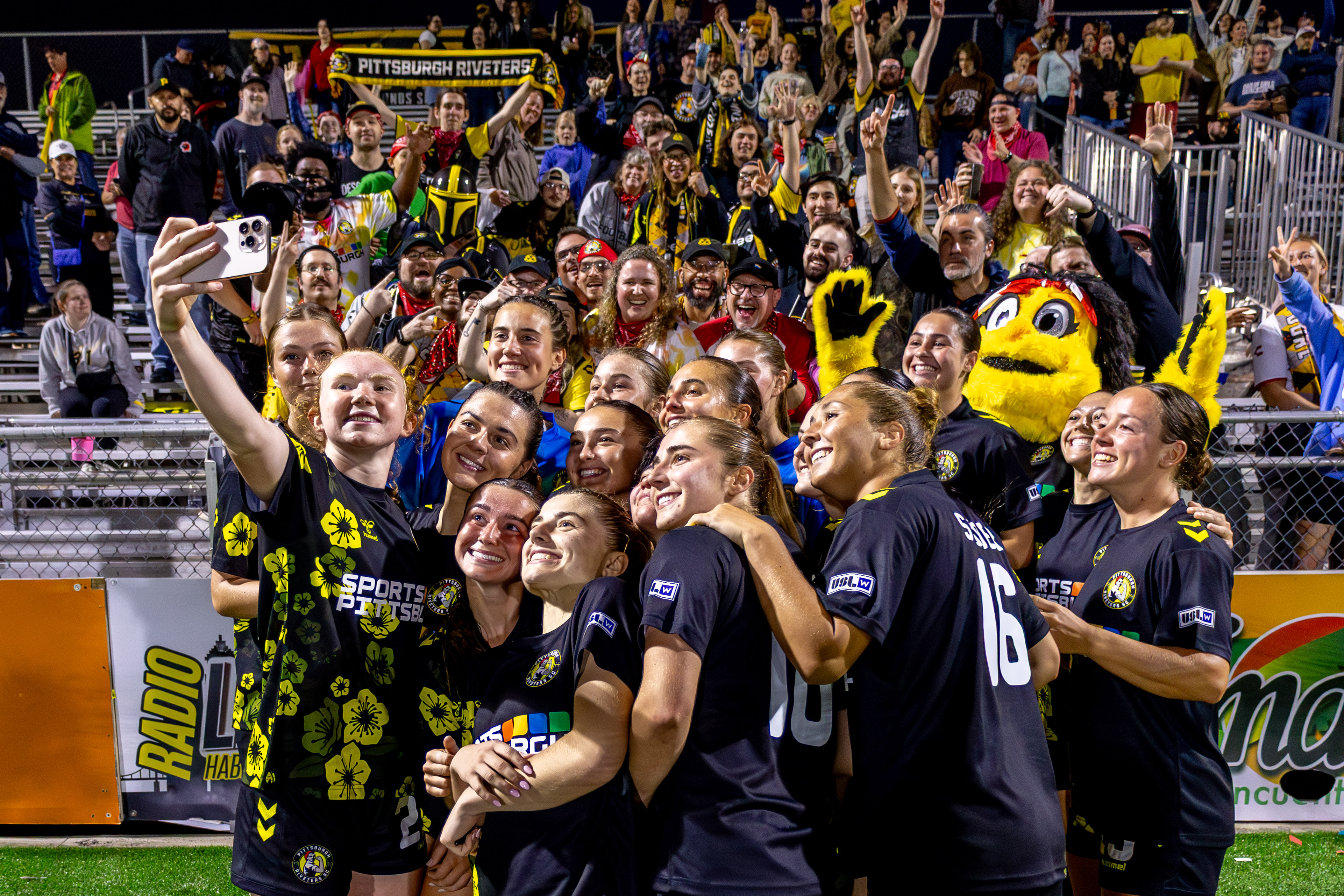 The Pittsburgh Riveters take a team selfie in front of fans at F.N.B. Stadium after their season opener against FC Buffalo on May 16, 2026. (Photo: Chris Cowger/Riveters SC)