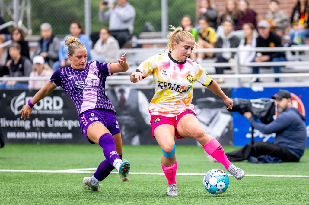Pittsburgh Riveters midfielder Ellen Molloy evades the pressure from Flower City 1872 midfielder Mia Gray in the teams' match May 23, 2026 at F.N.B. Stadium in Pittsburgh. (Photo: Chris Cowger/Riveters SC)