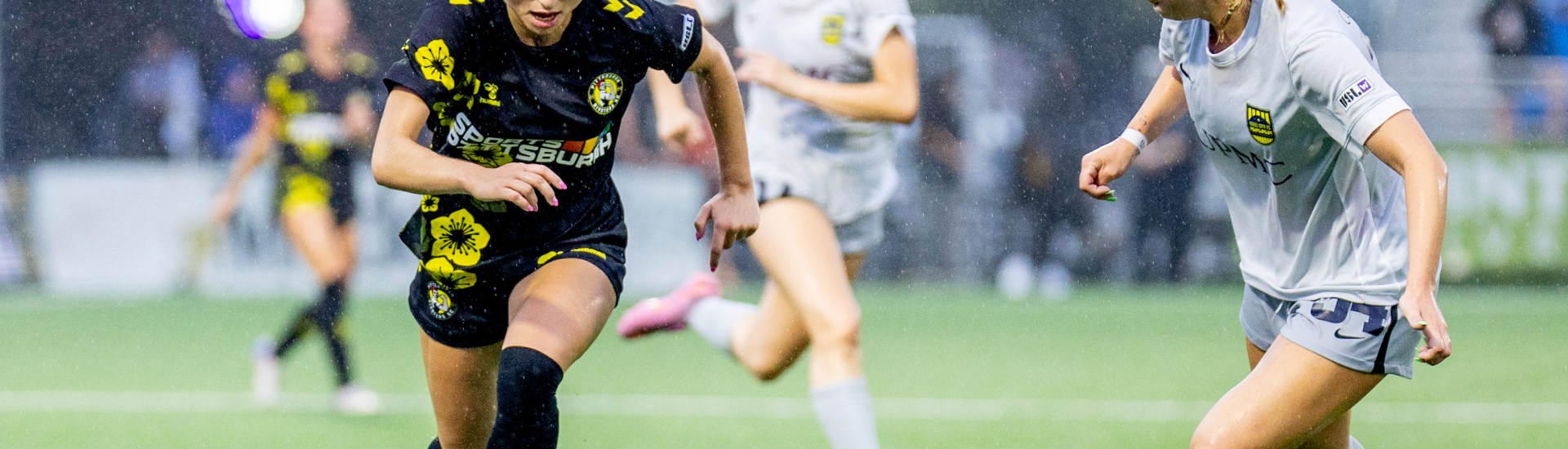 Lola Abraham dribbles the ball around a Steel City FC defender in the Pittsburgh Riveters' 5-0 win on June 27, 2026 at F.N.B. Stadium in Pittsburgh. (Photo: Chris Cowger/Riveters SC)