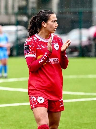 Riveters alumna Olivia Damico in match action
